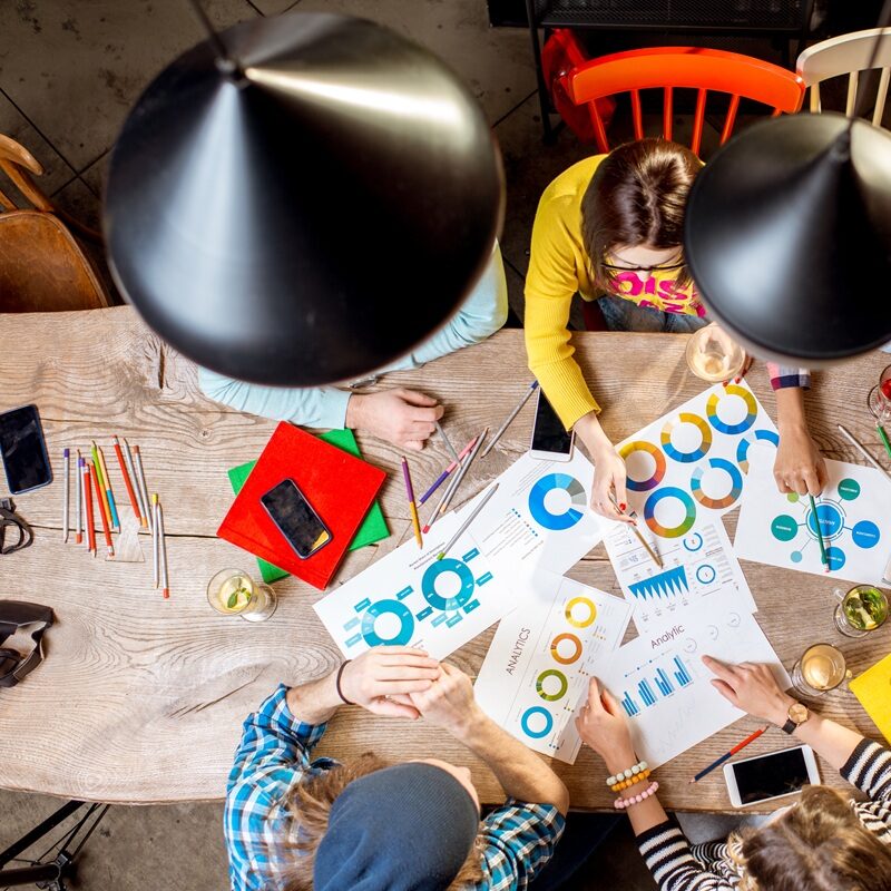 Group of people working at the table